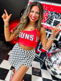 Guns UP one shoulder