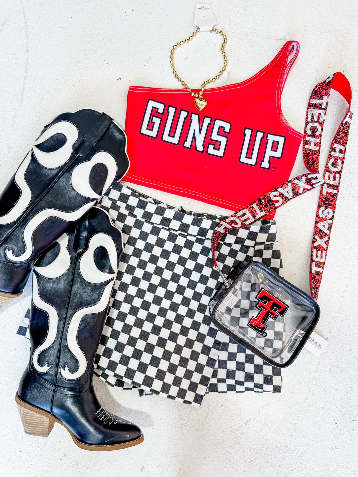 Guns UP one shoulder