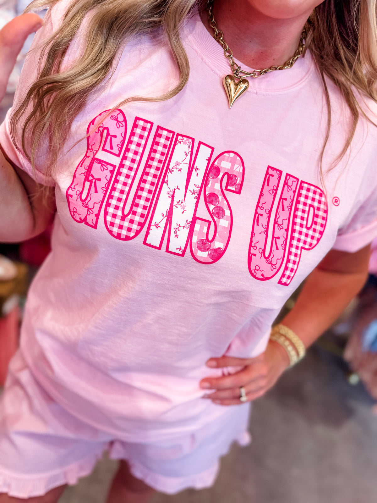 Cutesy Guns Up Tee